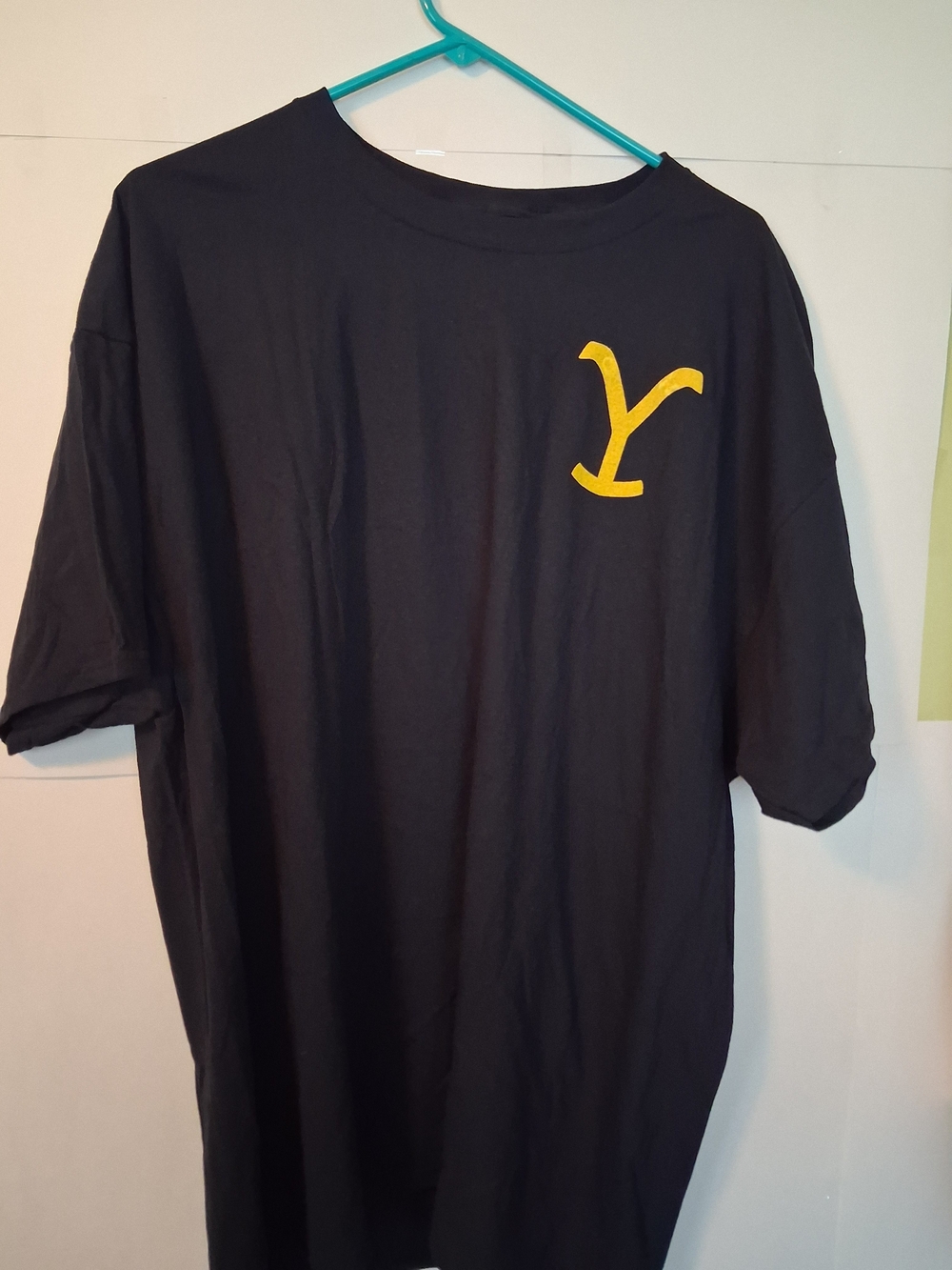 Black Short-Sleeve Crew Neck Tee with Yellow Emblem